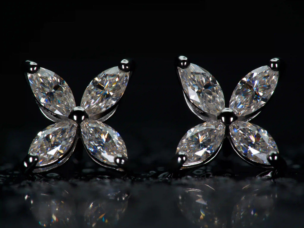Echte Fotos von Moissanite Ohrstecker X Design Marquise zeigen stärkeres funkeln als Diamant im echten licht. 